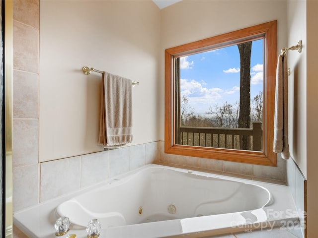 bathroom featuring a relaxing tiled tub