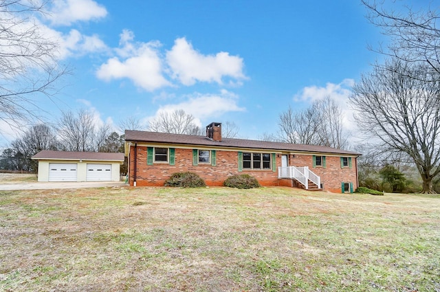 214 Hicks Hill Rd, Lawndale, NC 28090 - single story home with a chimney, brick siding, an outbuilding, a front lawn, and a garage