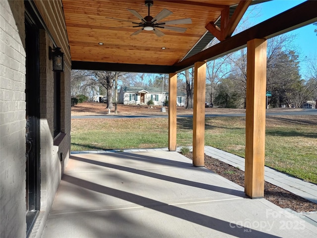 view of patio / terrace with ceiling fan and a porch