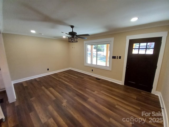 entryway with ceiling fan and dark hardwood / wood-style floors