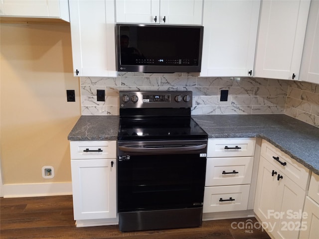 kitchen featuring backsplash, appliances with stainless steel finishes, dark hardwood / wood-style floors, and white cabinets