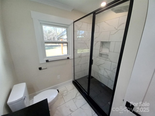 bathroom featuring toilet and walk in shower