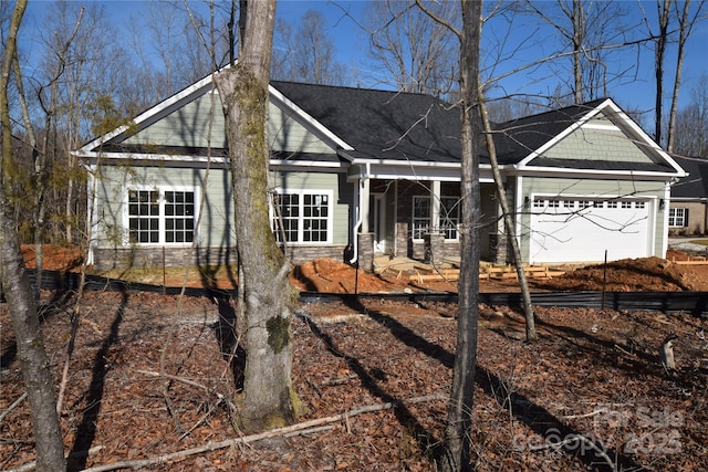 view of front of home with a garage