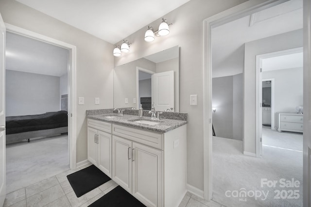 bathroom featuring vanity and tile patterned flooring