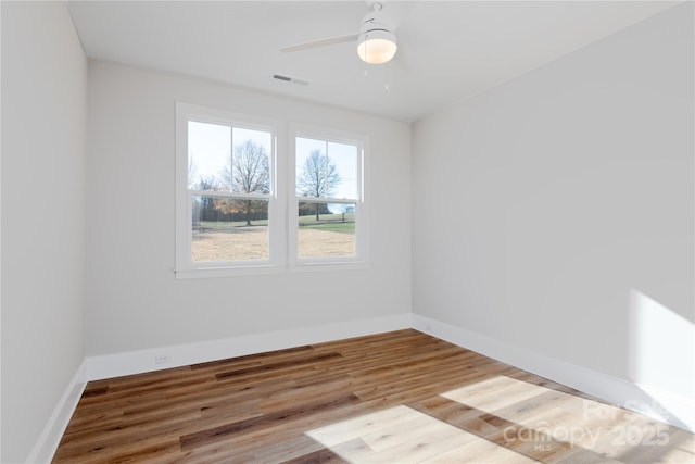 4243 Candlewood Dr Unit 9, Sherrills Ford, NC 28673 - empty room featuring baseboards, a ceiling fan, wood finished floors, and visible vents