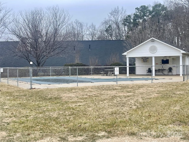 view of pool with a yard and a patio