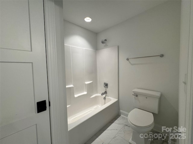 full bathroom with marble finish floor, toilet, bathing tub / shower combination, and baseboards