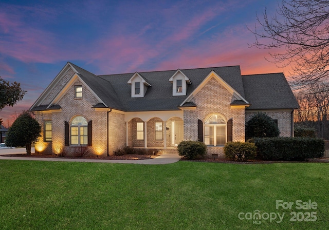 view of front property with a lawn