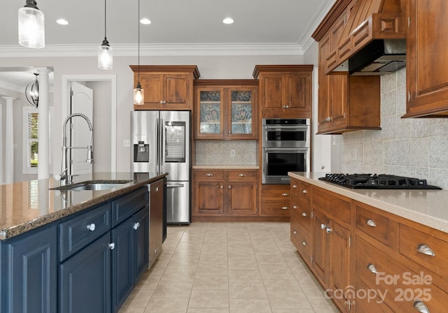 kitchen with premium range hood, sink, hanging light fixtures, dark stone countertops, and appliances with stainless steel finishes