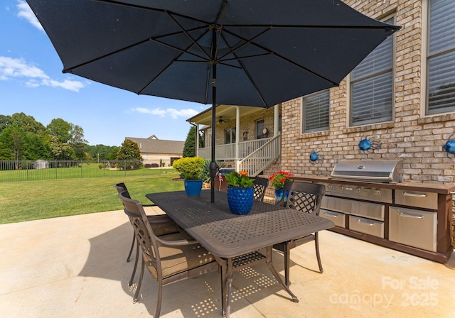 view of patio / terrace featuring exterior kitchen and grilling area