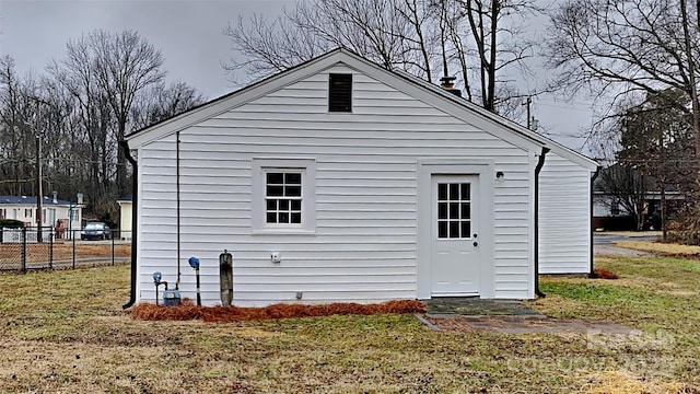 view of property exterior featuring a yard