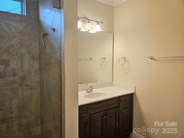 bathroom featuring vanity and a tile shower