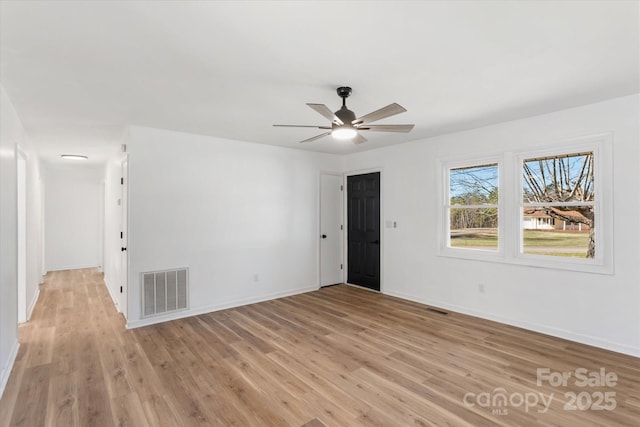 unfurnished room featuring ceiling fan and light hardwood / wood-style flooring