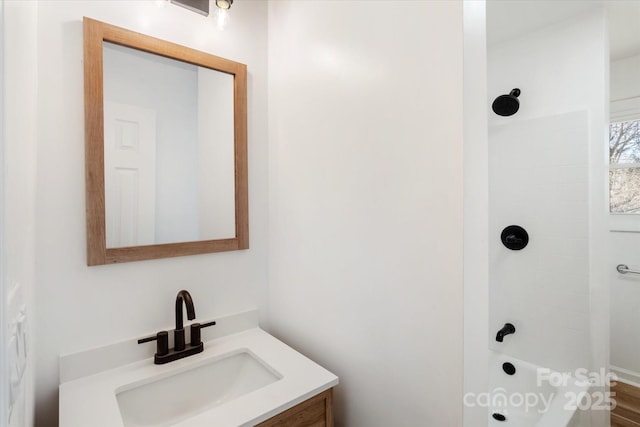 bathroom with vanity and bathtub / shower combination