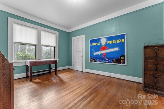 miscellaneous room featuring wood-type flooring