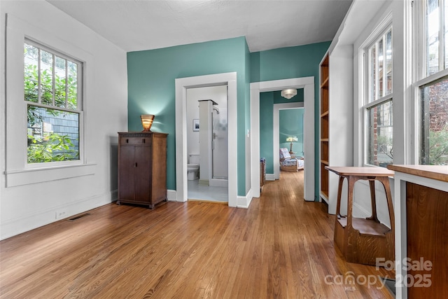 hall featuring light hardwood / wood-style floors