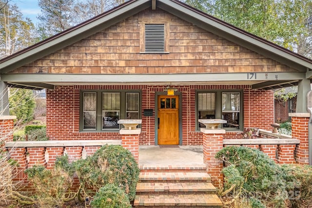 bungalow-style home with a porch