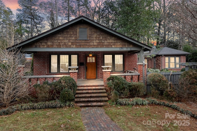 bungalow-style house with covered porch