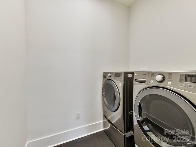 laundry area featuring washing machine and dryer