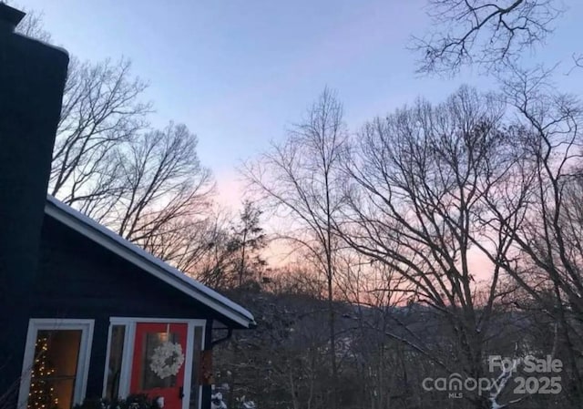 view of property exterior at dusk