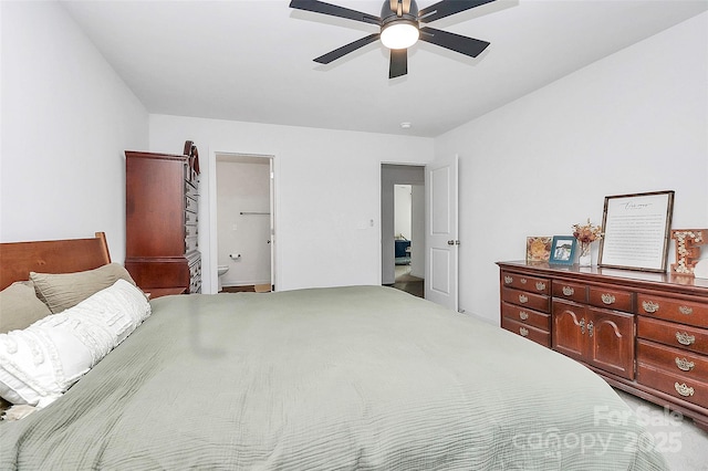 bedroom featuring ceiling fan and ensuite bathroom