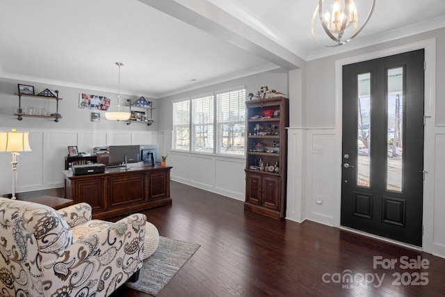 office space with ornamental molding, dark hardwood / wood-style floors, and a chandelier