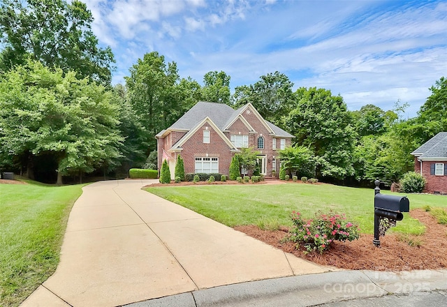 view of front of property with a front lawn