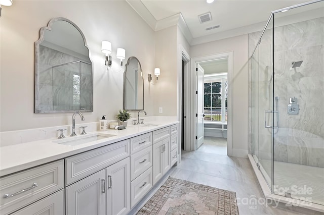 bathroom with an enclosed shower and vanity