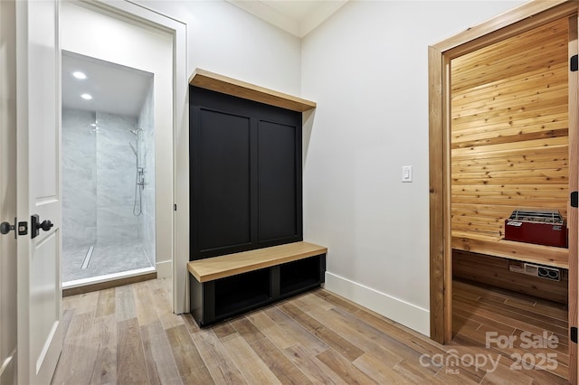 mudroom with light hardwood / wood-style flooring