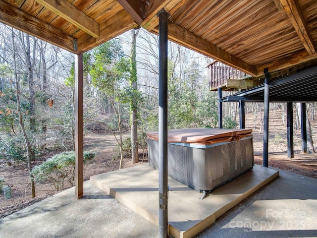 view of patio / terrace with a hot tub