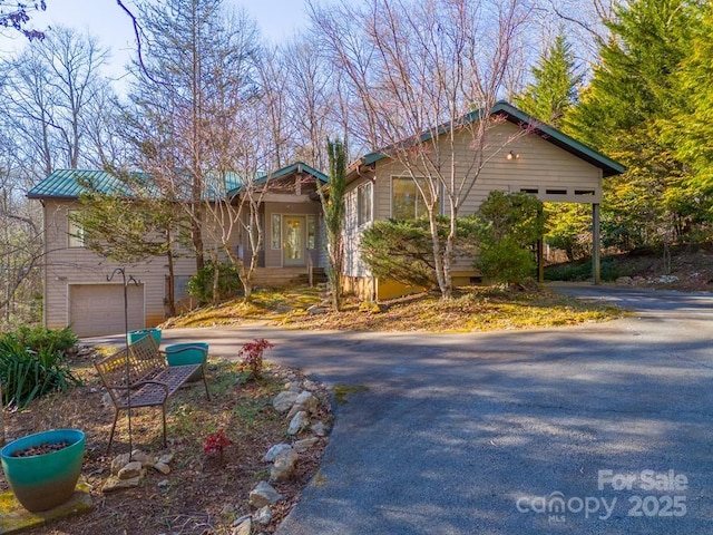 view of front of home with a garage