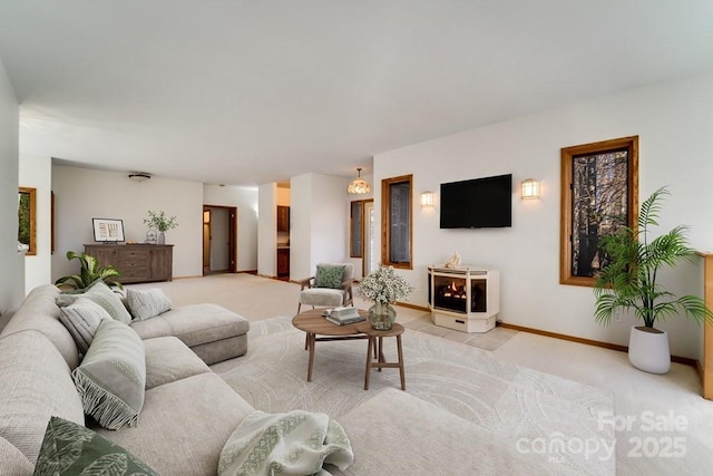 carpeted living room with a fireplace