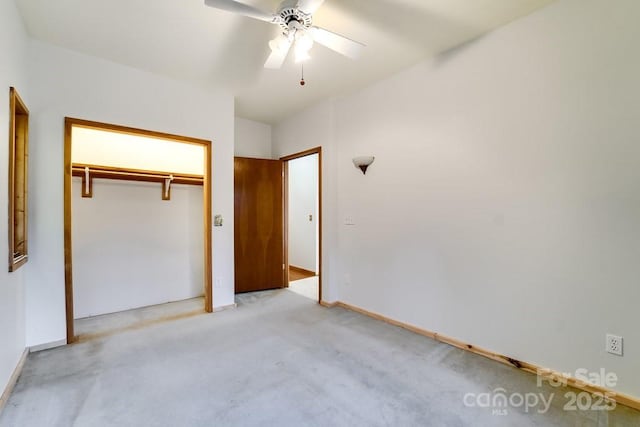 unfurnished bedroom featuring a closet and ceiling fan