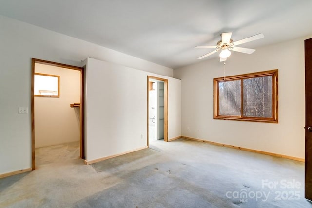 unfurnished room with light carpet and ceiling fan