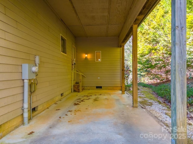 view of patio / terrace with a carport