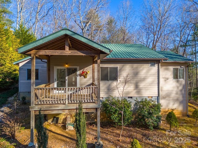 bungalow-style home featuring a deck