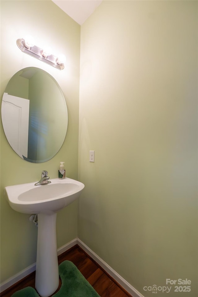 bathroom featuring hardwood / wood-style flooring