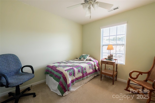 bedroom with light colored carpet and ceiling fan