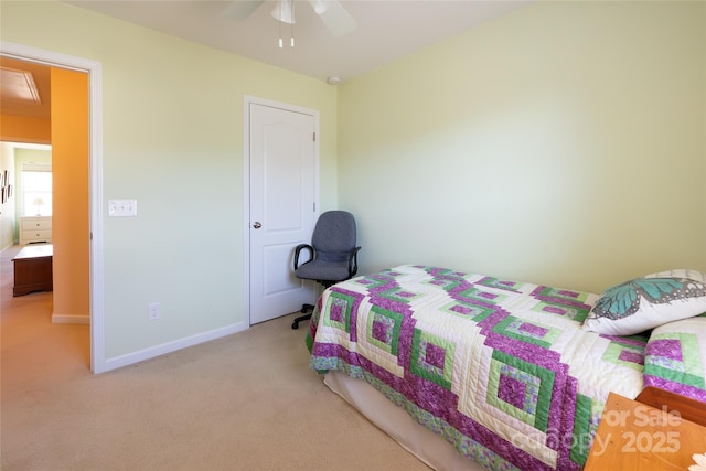 bedroom with light carpet and ceiling fan