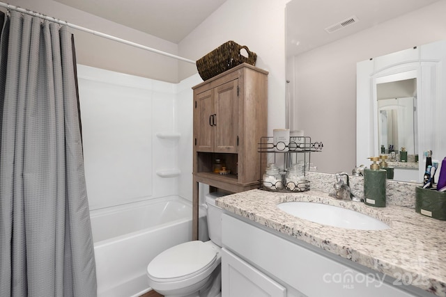 full bathroom featuring vanity, toilet, and shower / bath combo