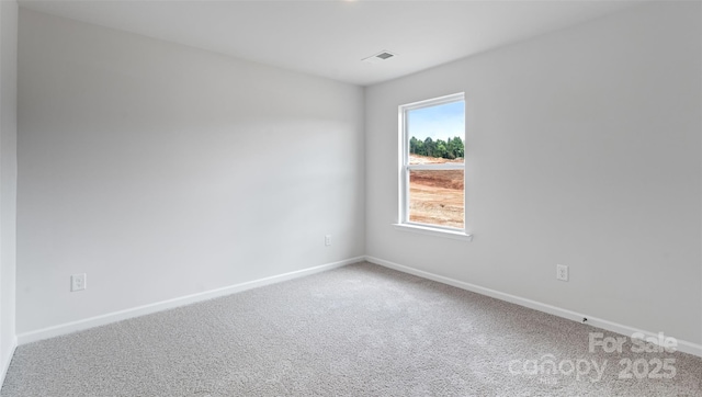 view of carpeted spare room