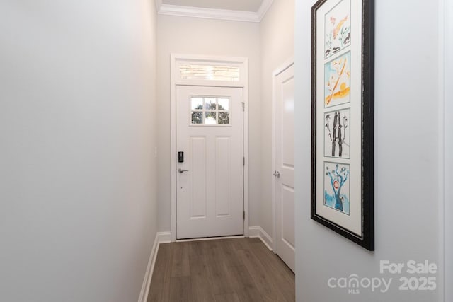 doorway with wood-type flooring and ornamental molding