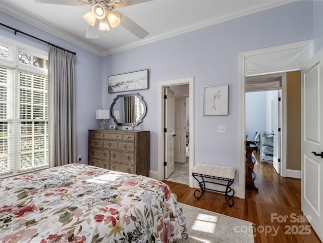 bedroom featuring ceiling fan, ornamental molding, dark hardwood / wood-style floors, and multiple windows