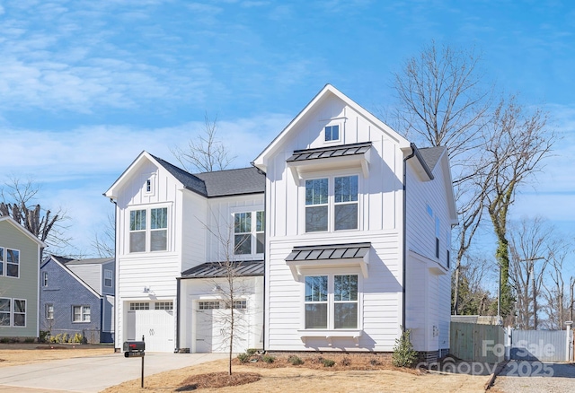 modern inspired farmhouse featuring a garage