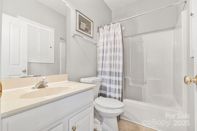 full bathroom with vanity, tile patterned floors, toilet, and shower / bath combo