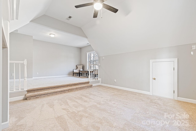 bonus room with carpet, lofted ceiling, and ceiling fan