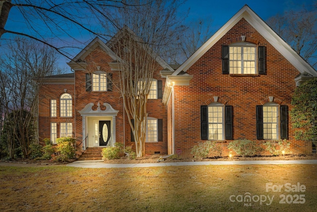 view of front property featuring a front lawn