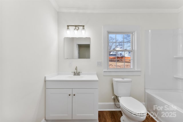 full bathroom featuring shower / tub combination, hardwood / wood-style flooring, vanity, ornamental molding, and toilet