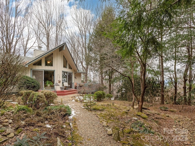 exterior space featuring a wooden deck