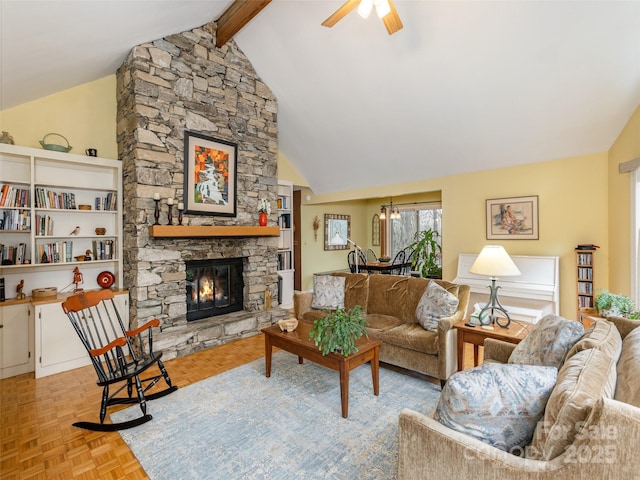 living room featuring vaulted ceiling with beams, a fireplace, light parquet flooring, and ceiling fan